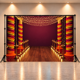 Traditional Indian Wedding Backdrop with Marigold Garlands and Diya Lighting Decor