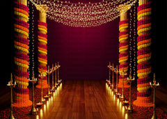 Traditional Indian Wedding Backdrop with Marigold Garlands and Diya Lighting Decor